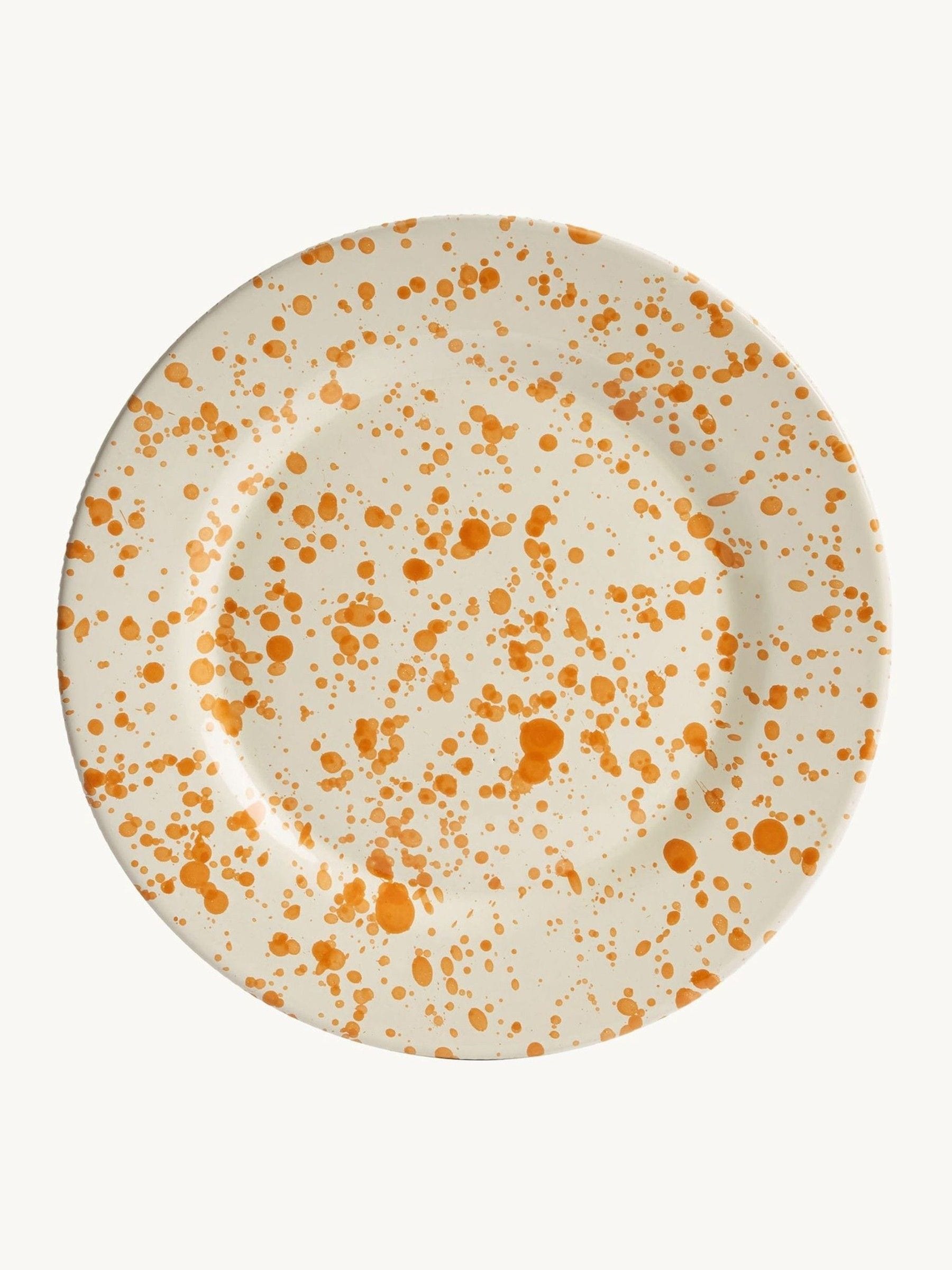 Hot Pottery burnt orange splatter 12-piece dinner set, imported from the UK