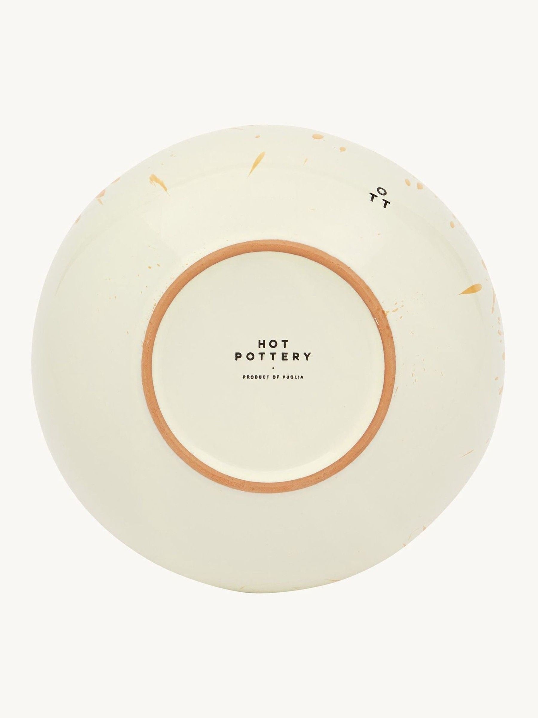 Hot Pottery burnt orange splatter 12-piece dinner set, imported from the UK