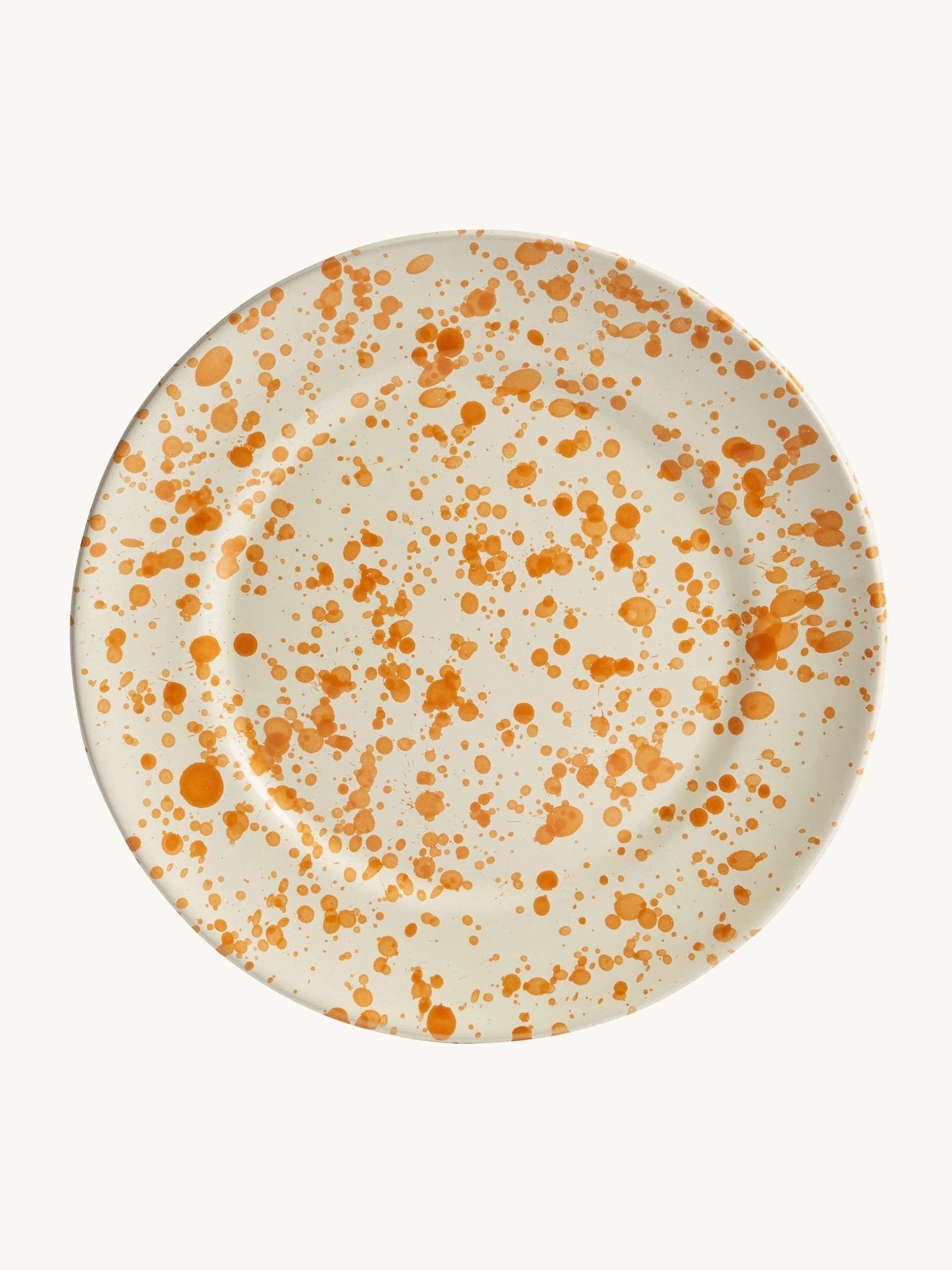 Hot Pottery burnt orange splatter 12-piece dinner set, imported from the UK