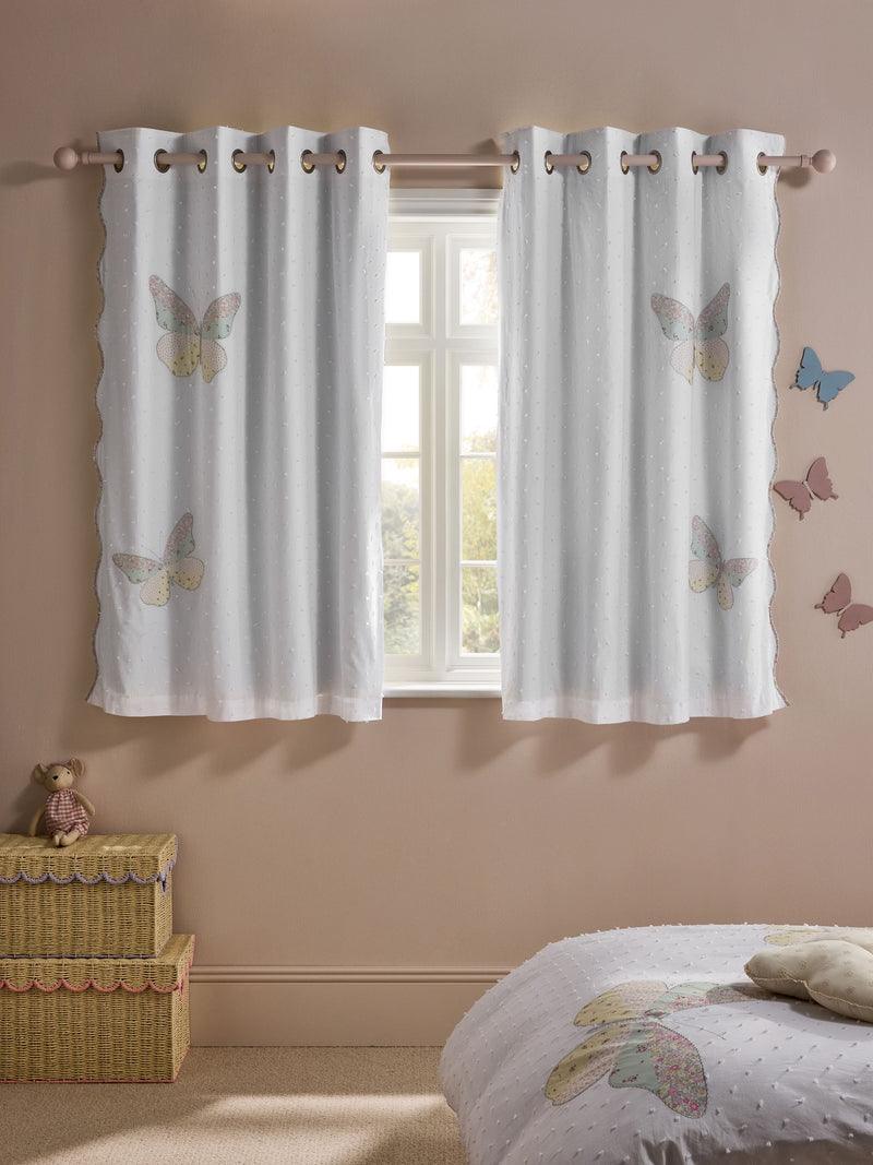 White floral butterfly eyelet blackout curtains (British brand)