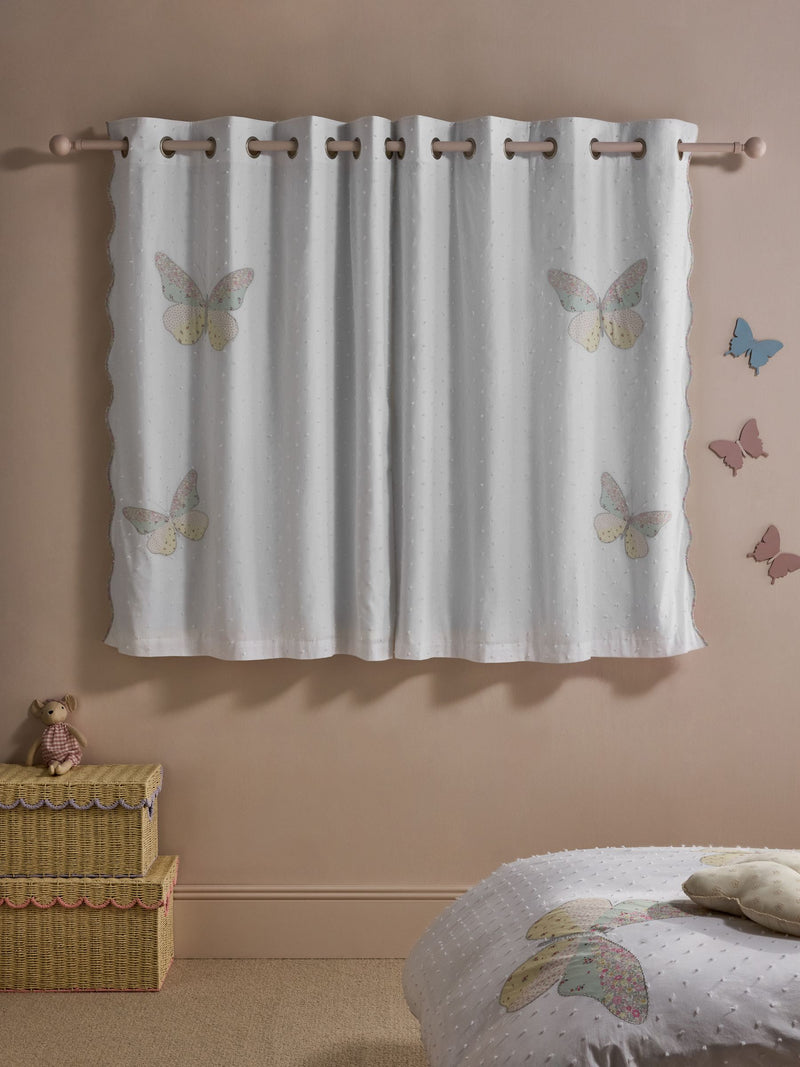 White floral butterfly eyelet blackout curtains (British brand)