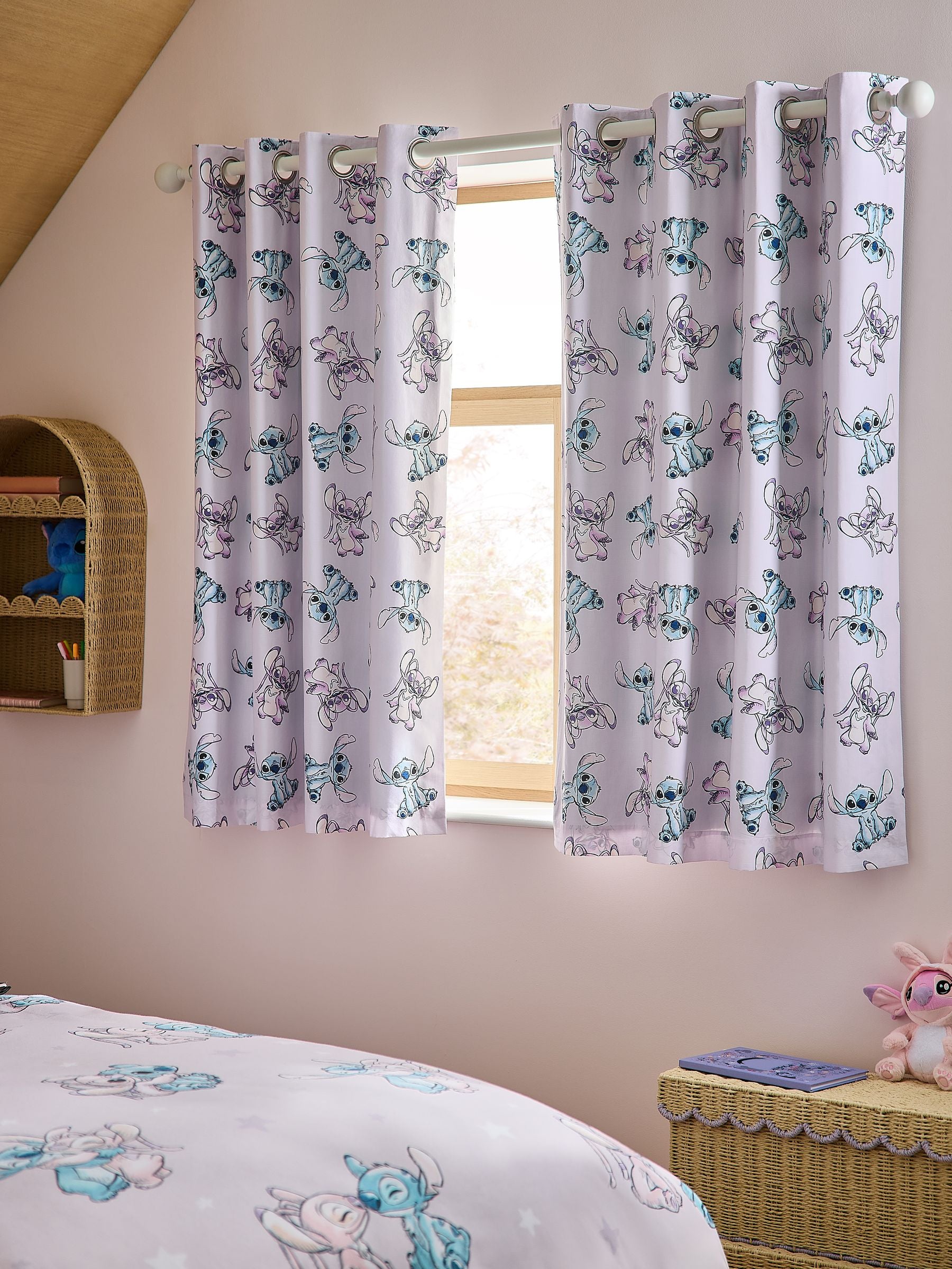 Pink Lilo and Stitch eyelet blackout curtains, imported from the UK