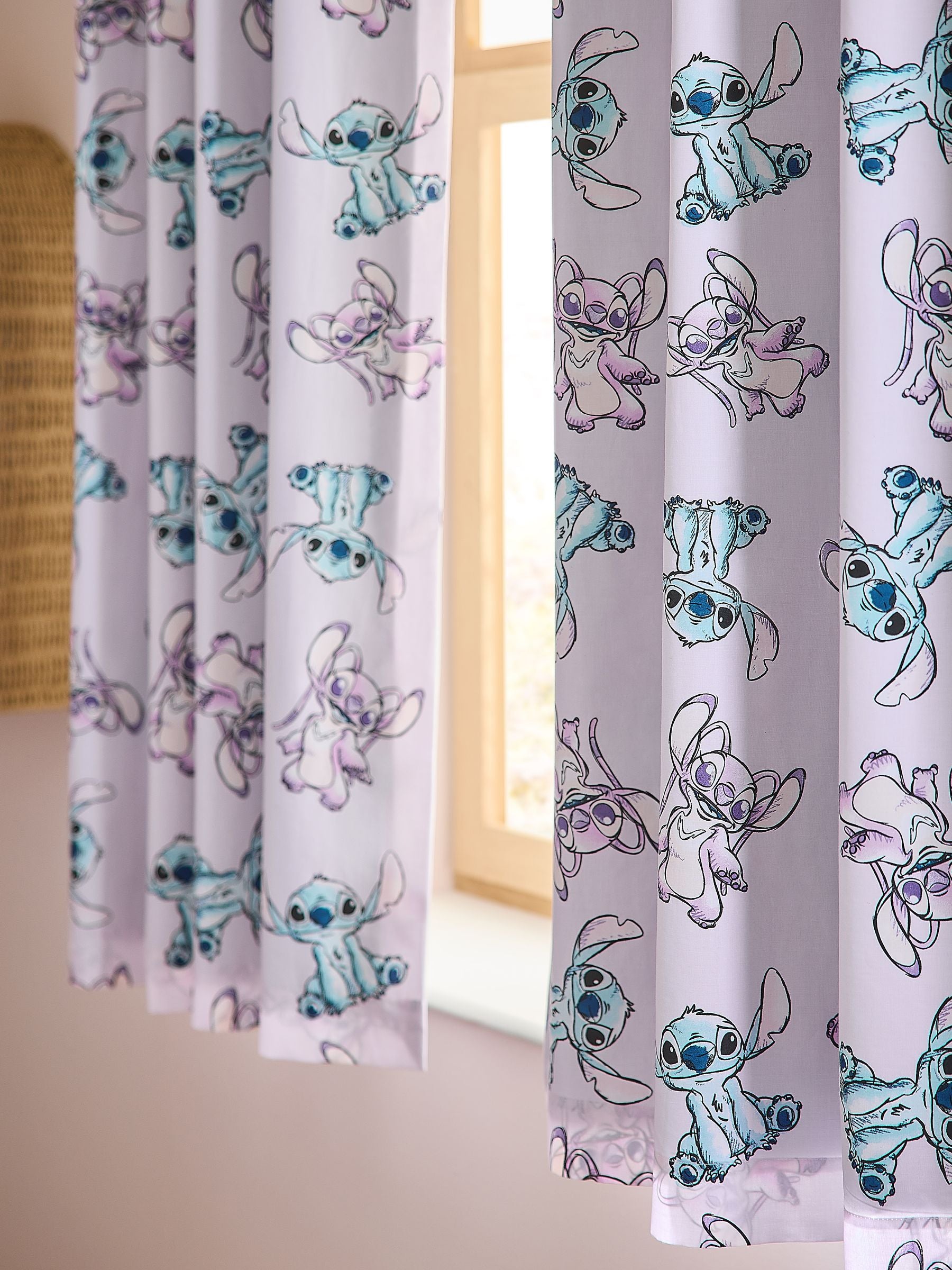 Pink Lilo and Stitch eyelet blackout curtains, imported from the UK