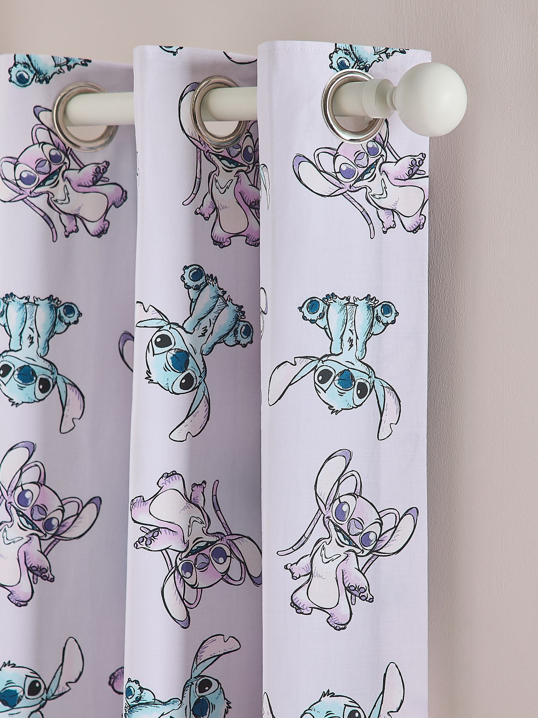 Pink Lilo and Stitch eyelet blackout curtains, imported from the UK