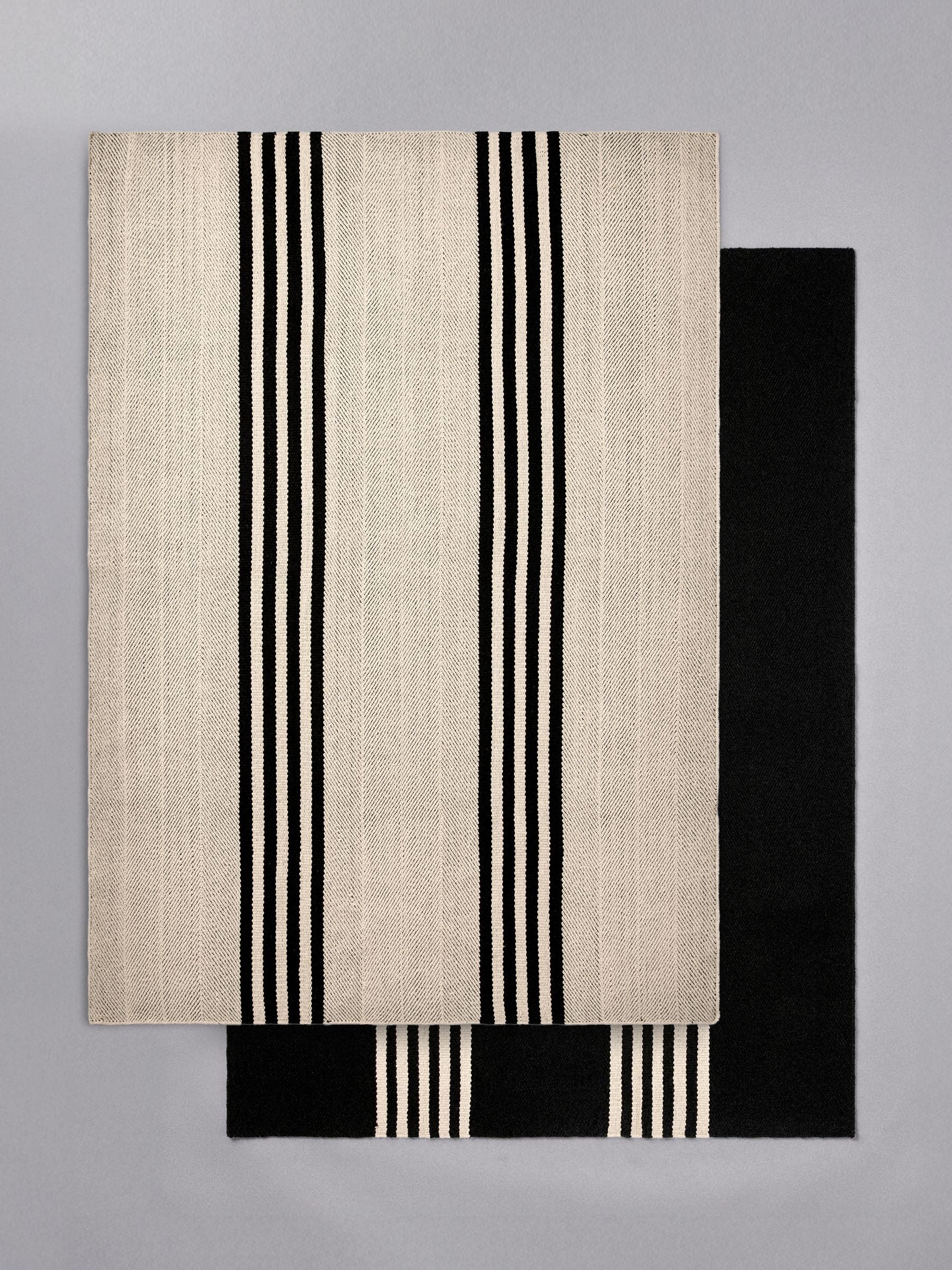 The Set 2 Pack Black Cotton Stripe Woven Herringbone Flatweave Rugs
