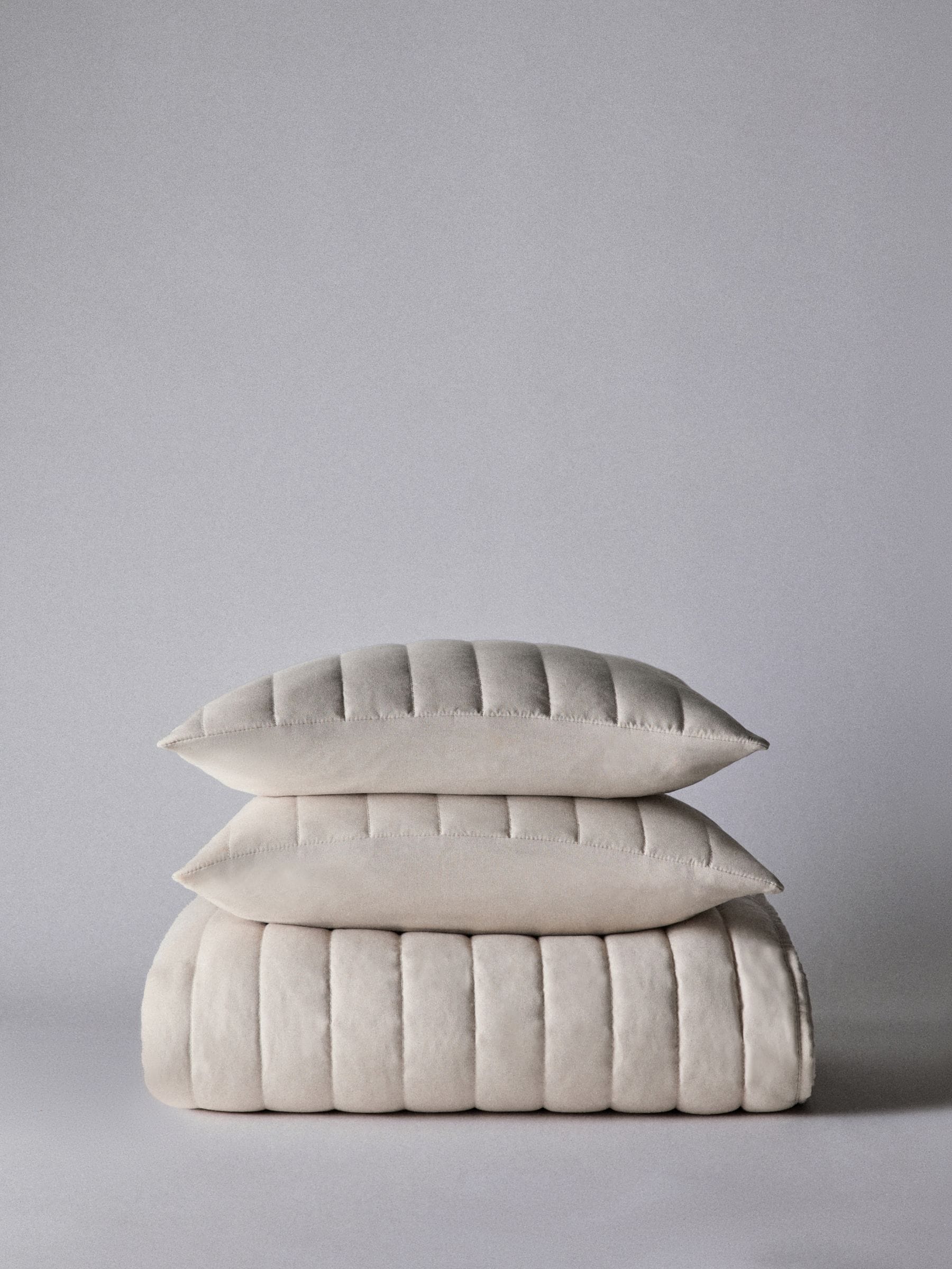 The Set 3 Piece Natural Quilted Bedspread and Cushion Covers