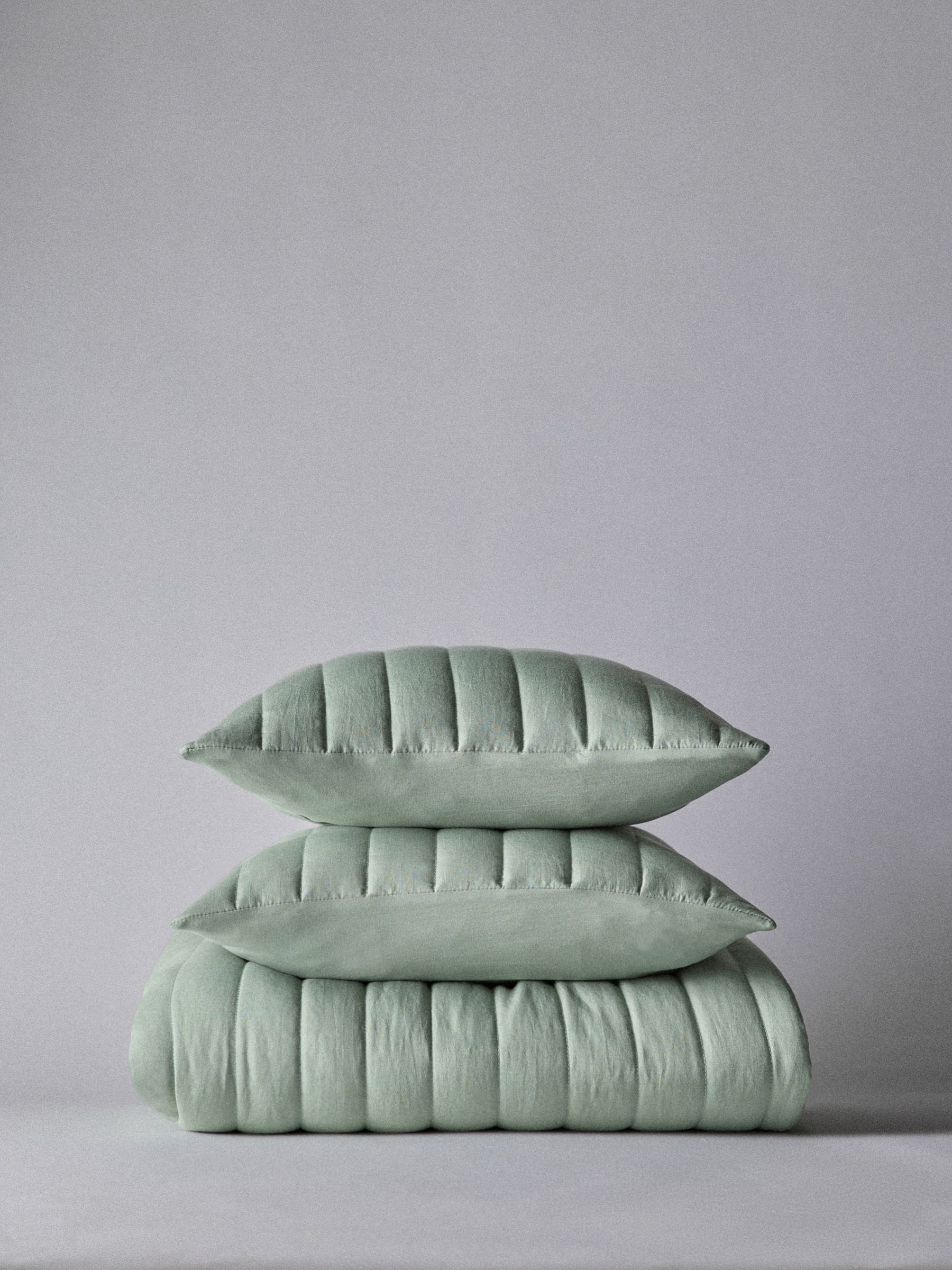 The Set 3 Piece Green Quilted Bedspread and Cushion Covers