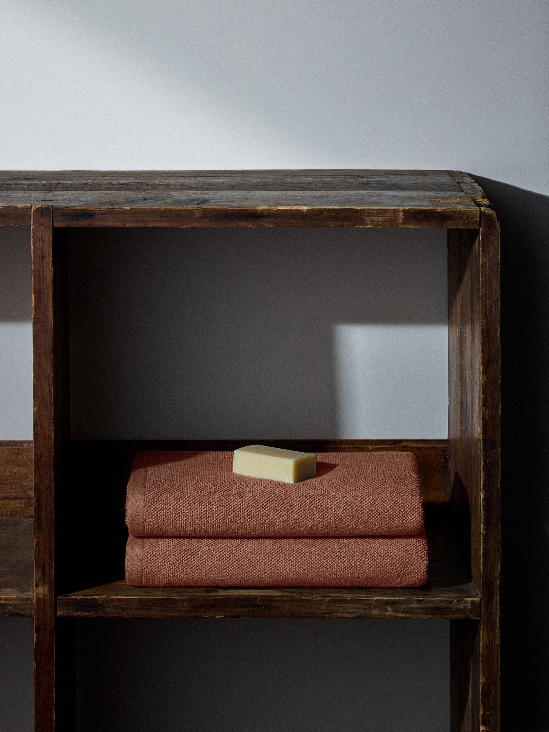 The Set rust popcorn textured 100% cotton bath towels, imported from the UK