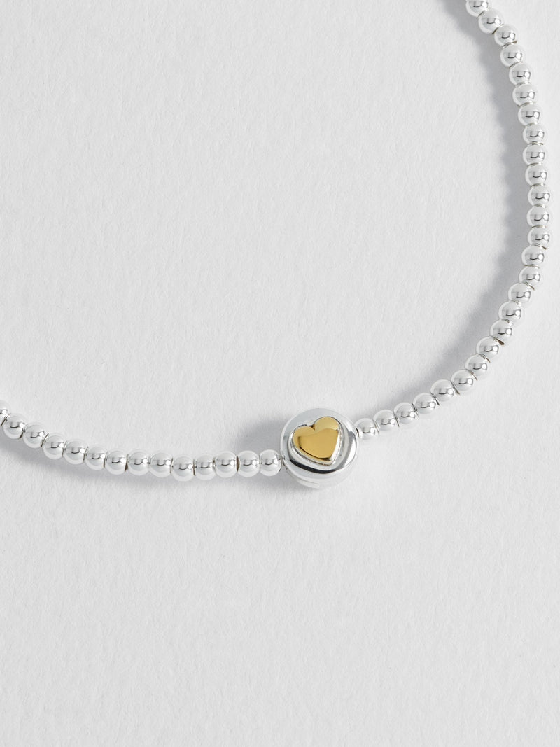 Estella Bartlett Silver Tone Heart Disc Bead Bracelet - British product