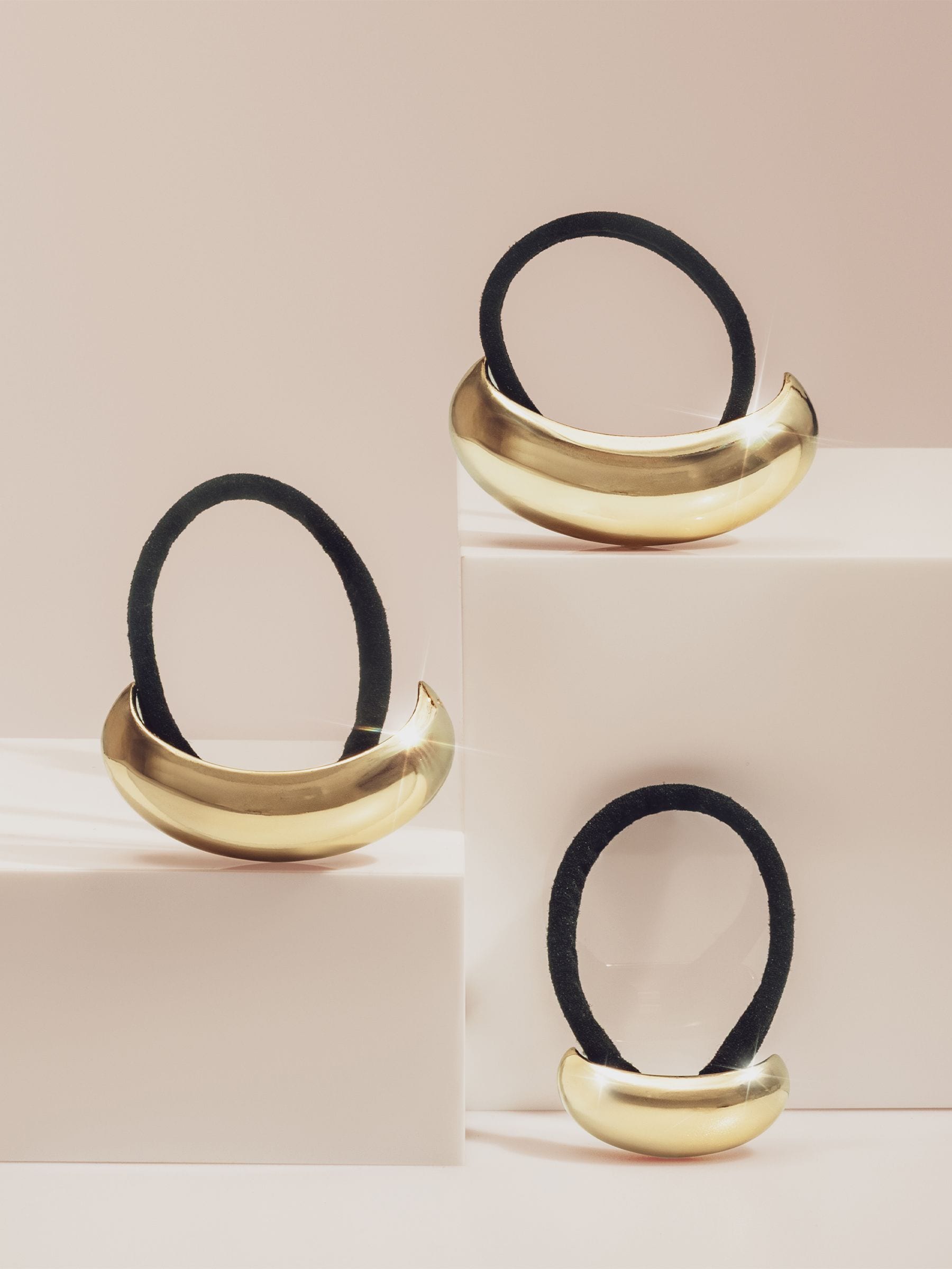 Kitsch medium gold cloud ponytail cuff - British product