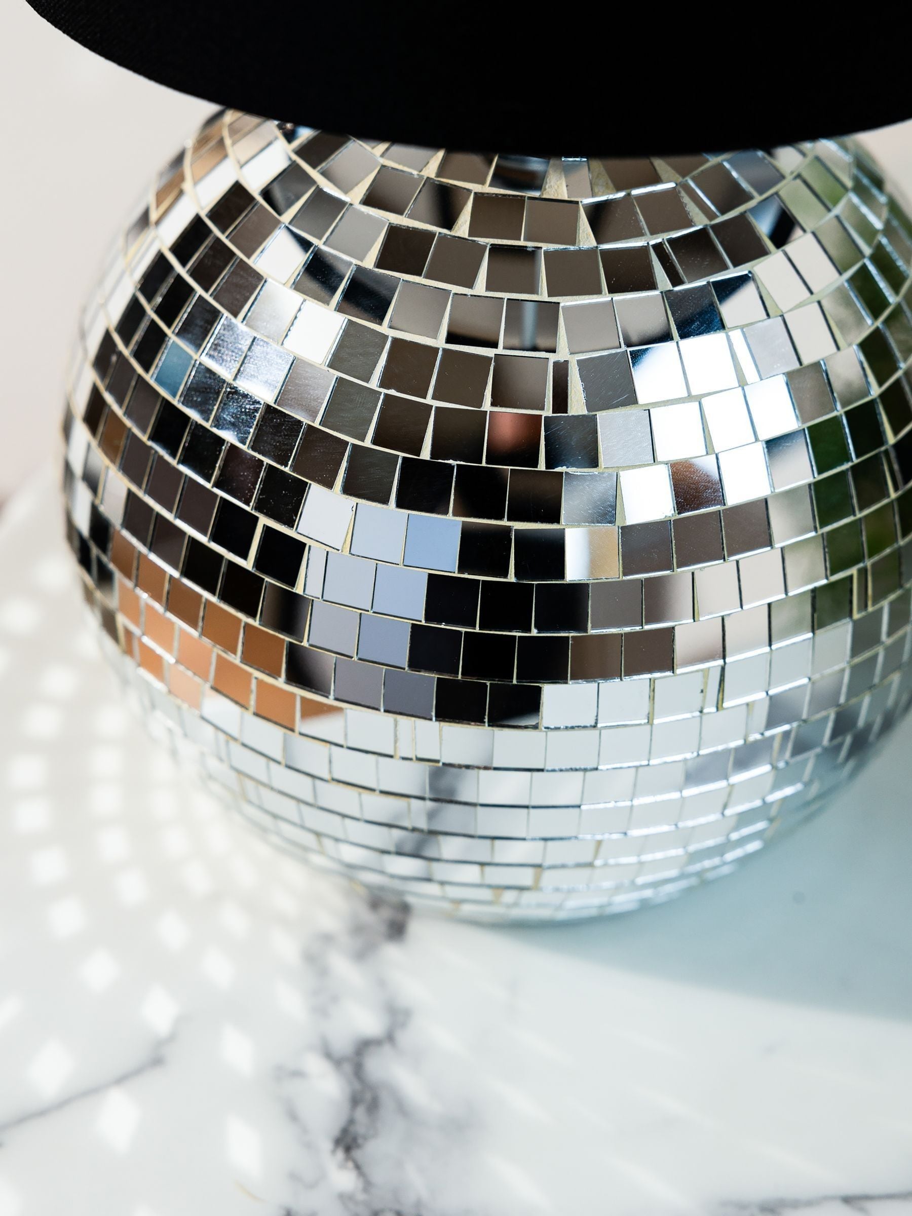 Rockett St George silver disco ball table lamp, imported from the UK