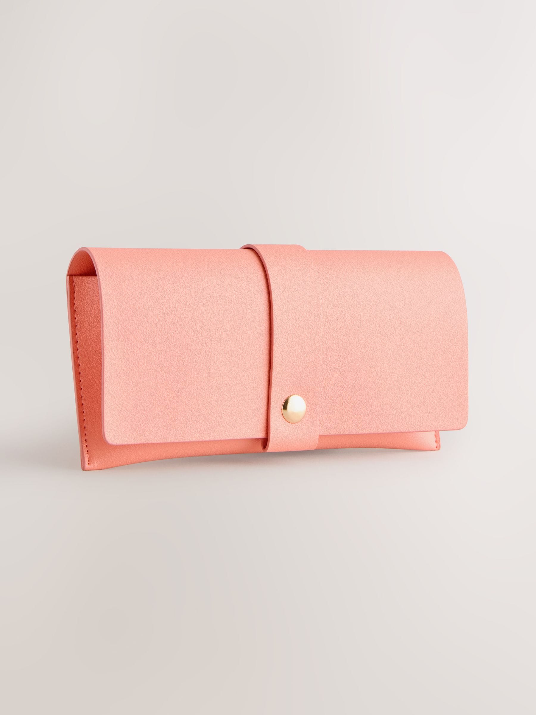 Orange sunglasses case for storage, imported from the UK