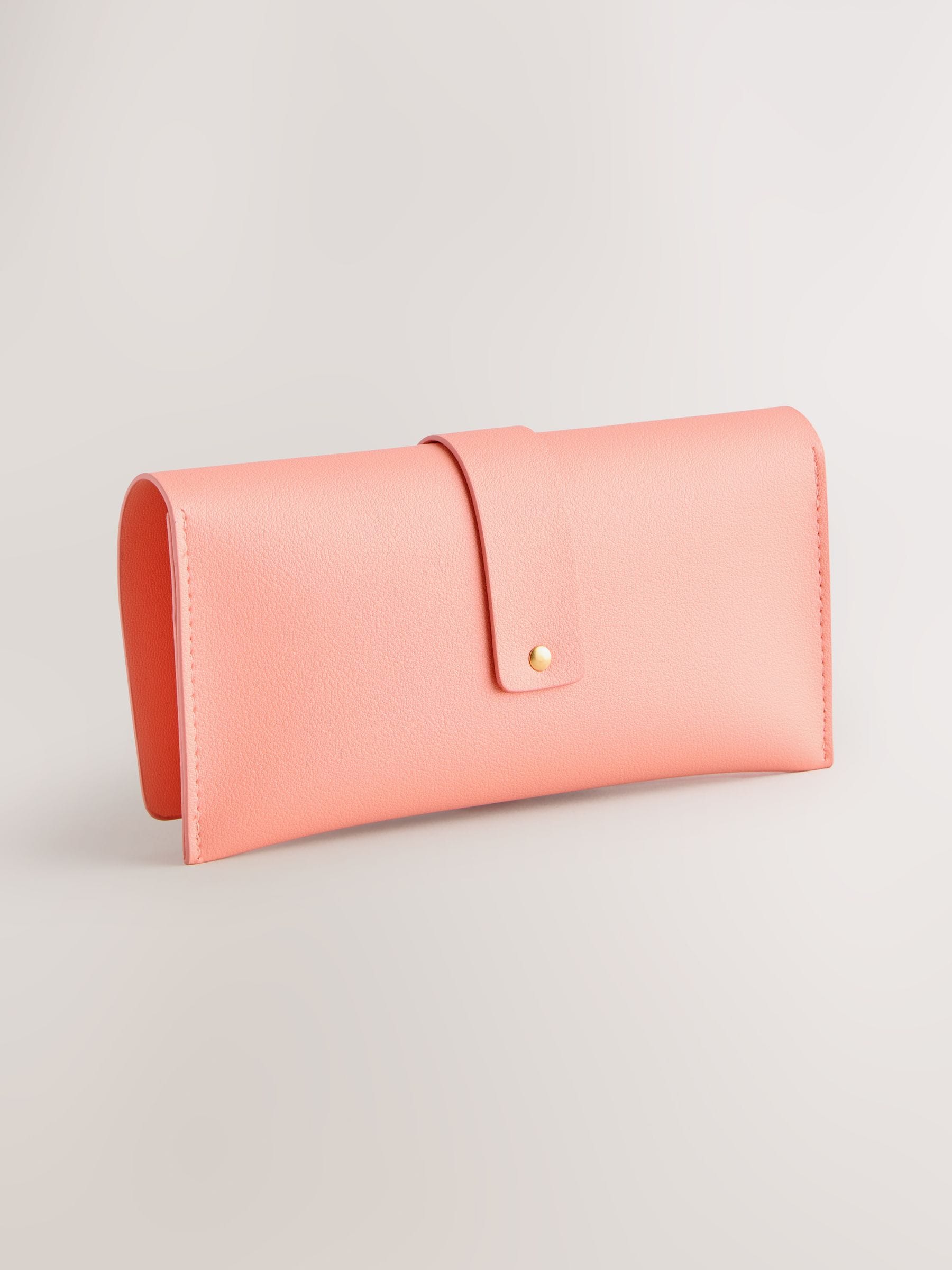 Orange sunglasses case for storage, imported from the UK