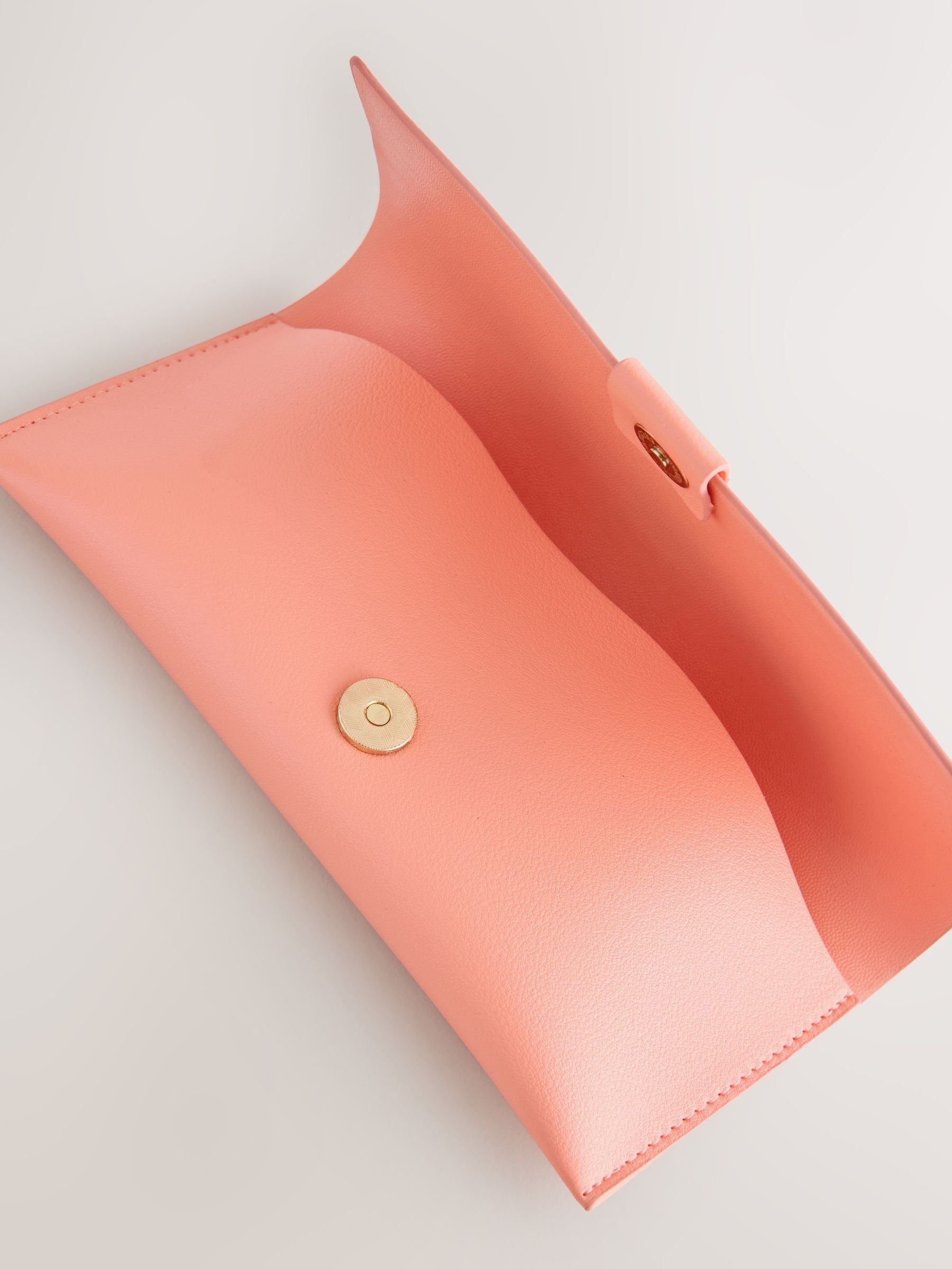 Orange sunglasses case for storage, imported from the UK
