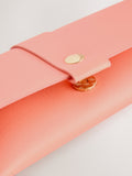 Orange sunglasses case for storage, imported from the UK