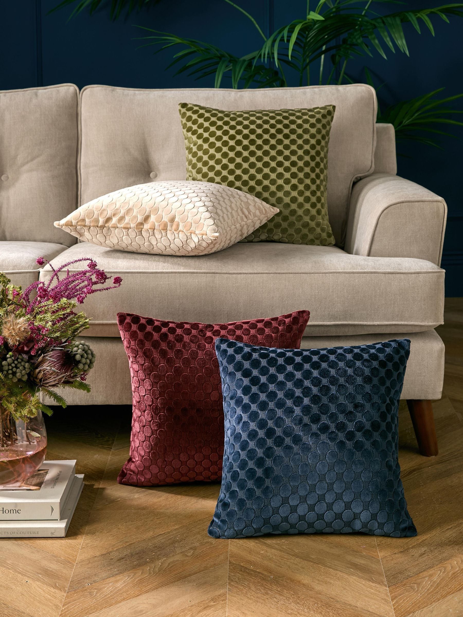 Soiree green velvet spot cushion 43cm, imported from the UK