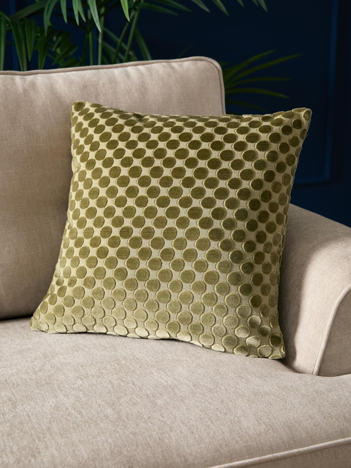 Soiree green velvet spot cushion 43cm, imported from the UK