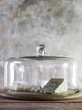 Nkuku glass cake dome stand mango wood base, imported from the UK