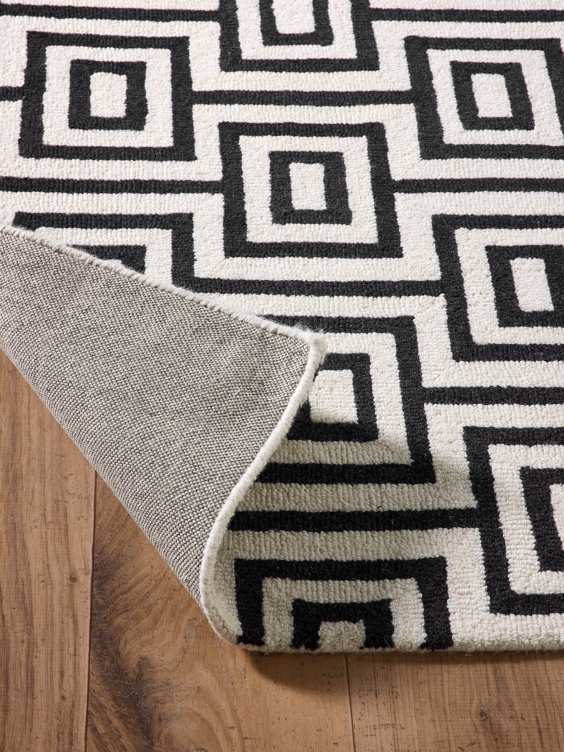 Origin Rugs Black Labyrinth wool rug, imported from the UK
