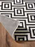 Origin Rugs Black Labyrinth wool rug, imported from the UK