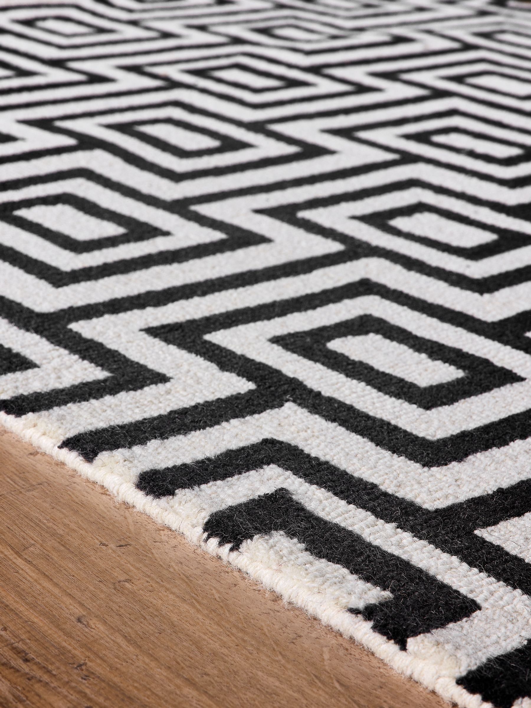 Origin Rugs Black Labyrinth wool rug, imported from the UK