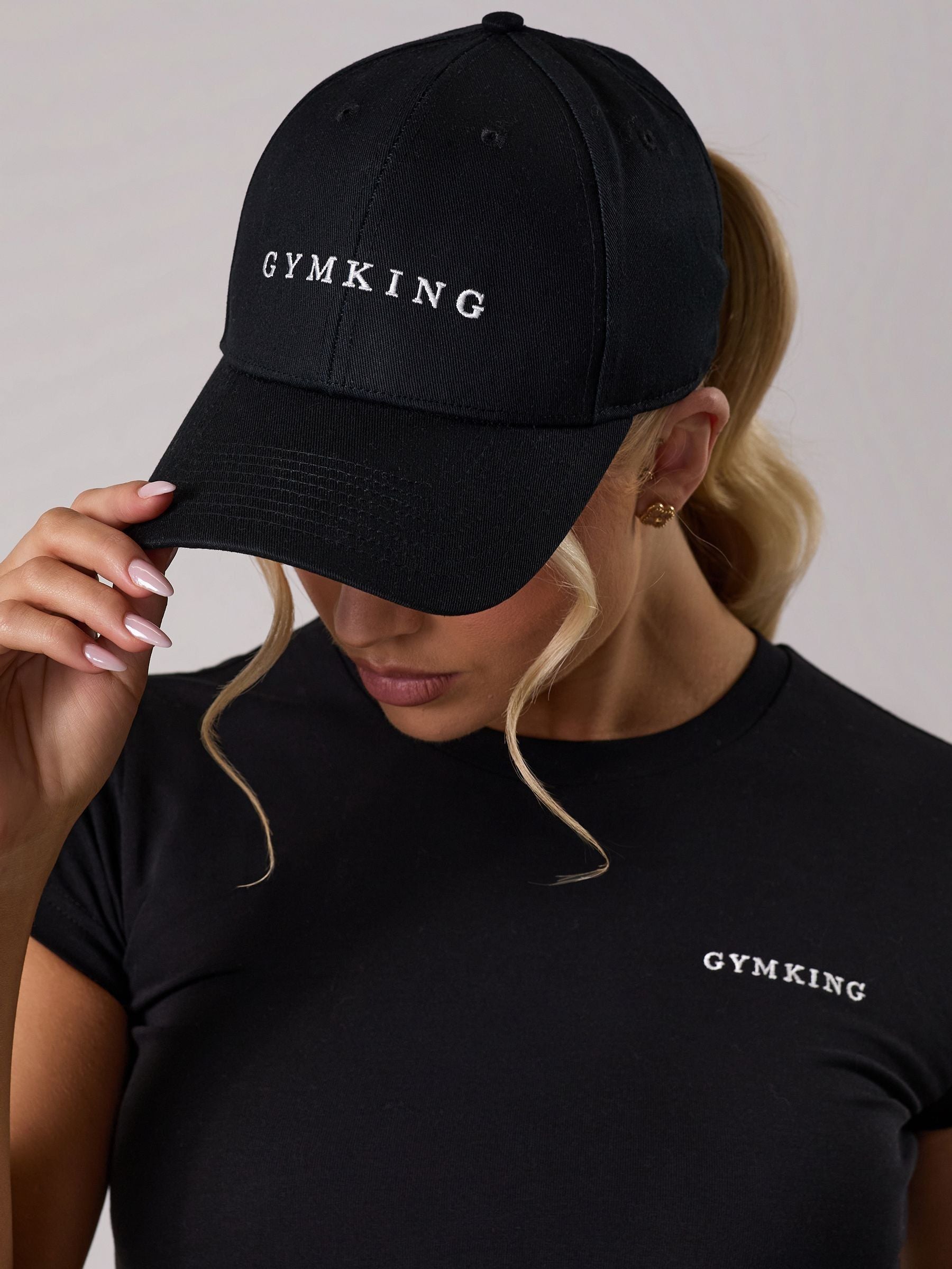 Gym King black linear pitcher cap, imported from the UK
