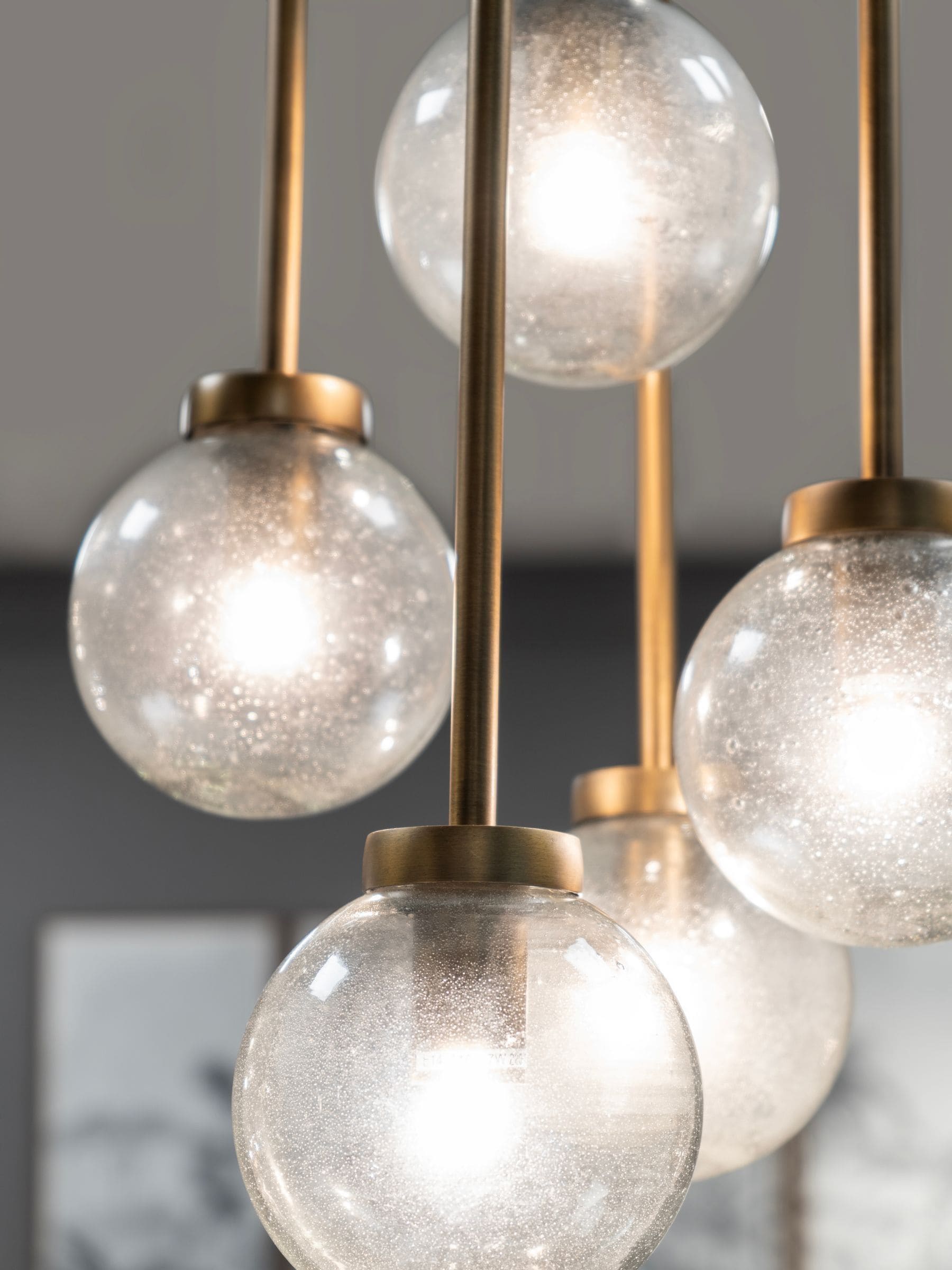 Libra Interiors brass Wellesley pendant with five glass globes, UK version