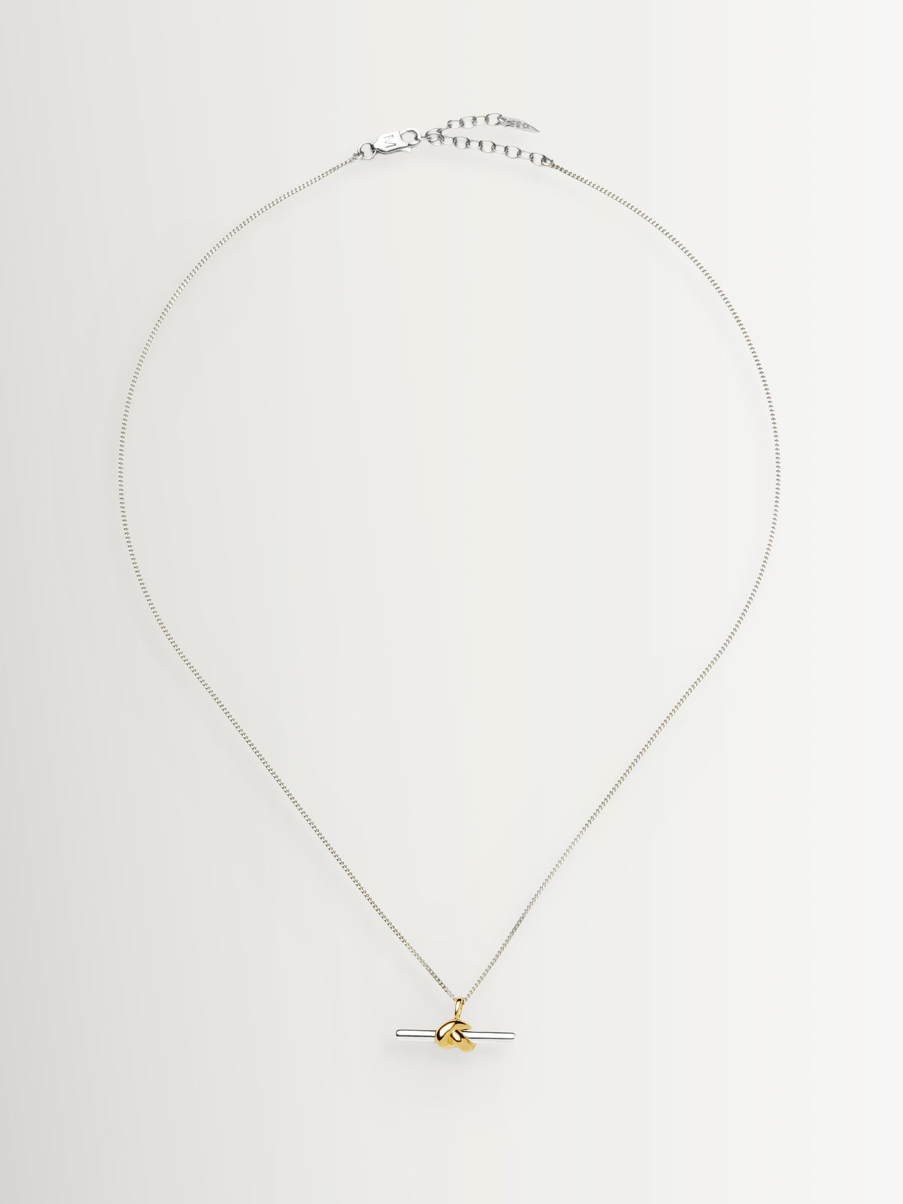 Missoma gold tone T-bar knot pendant necklace, imported from the UK
