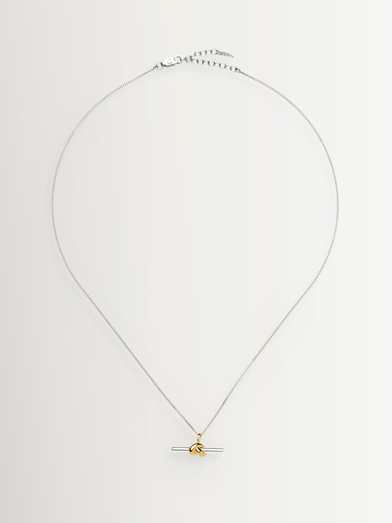 Missoma gold tone T-bar knot pendant necklace, imported from the UK