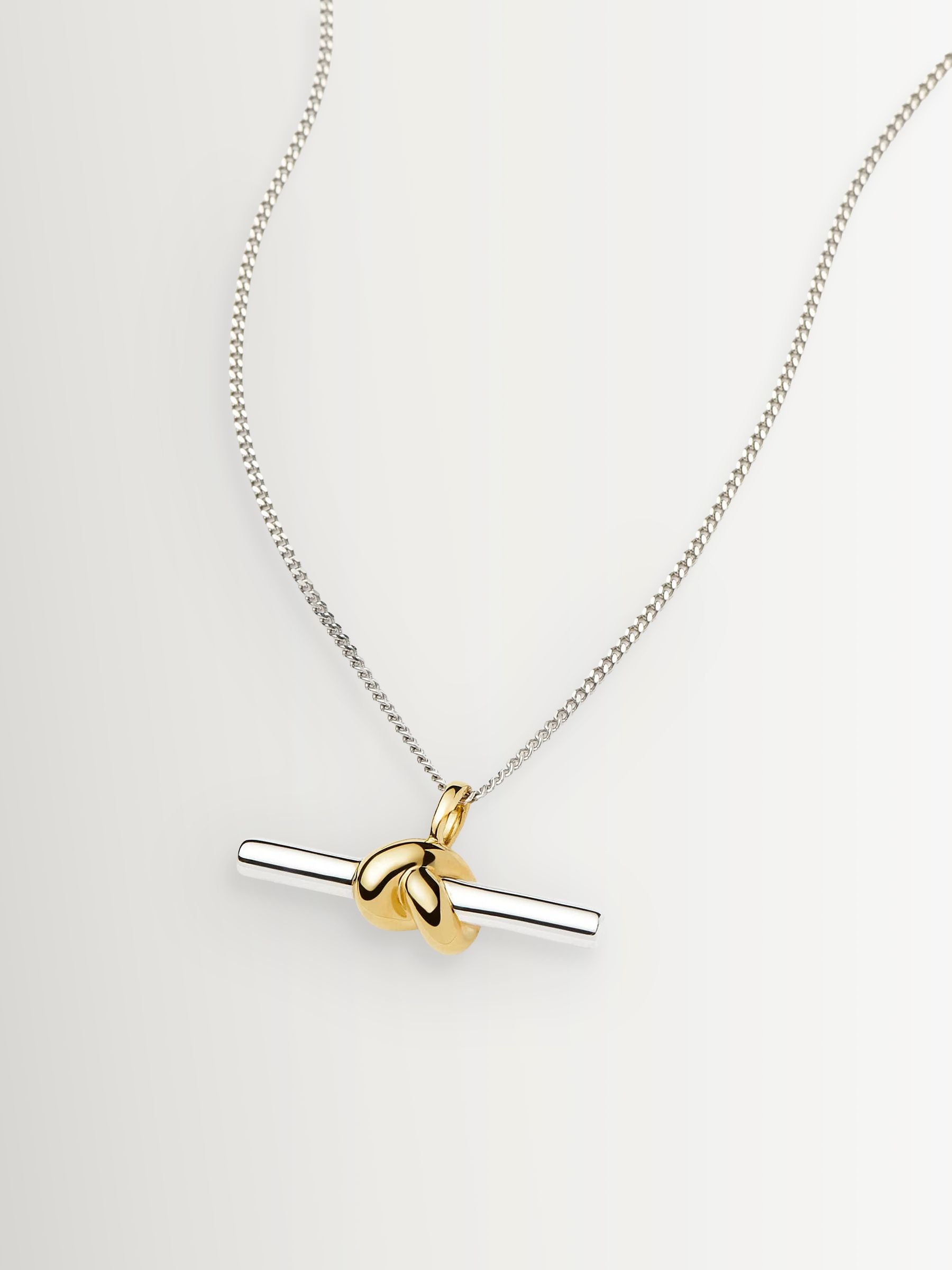 Missoma gold tone T-bar knot pendant necklace, imported from the UK