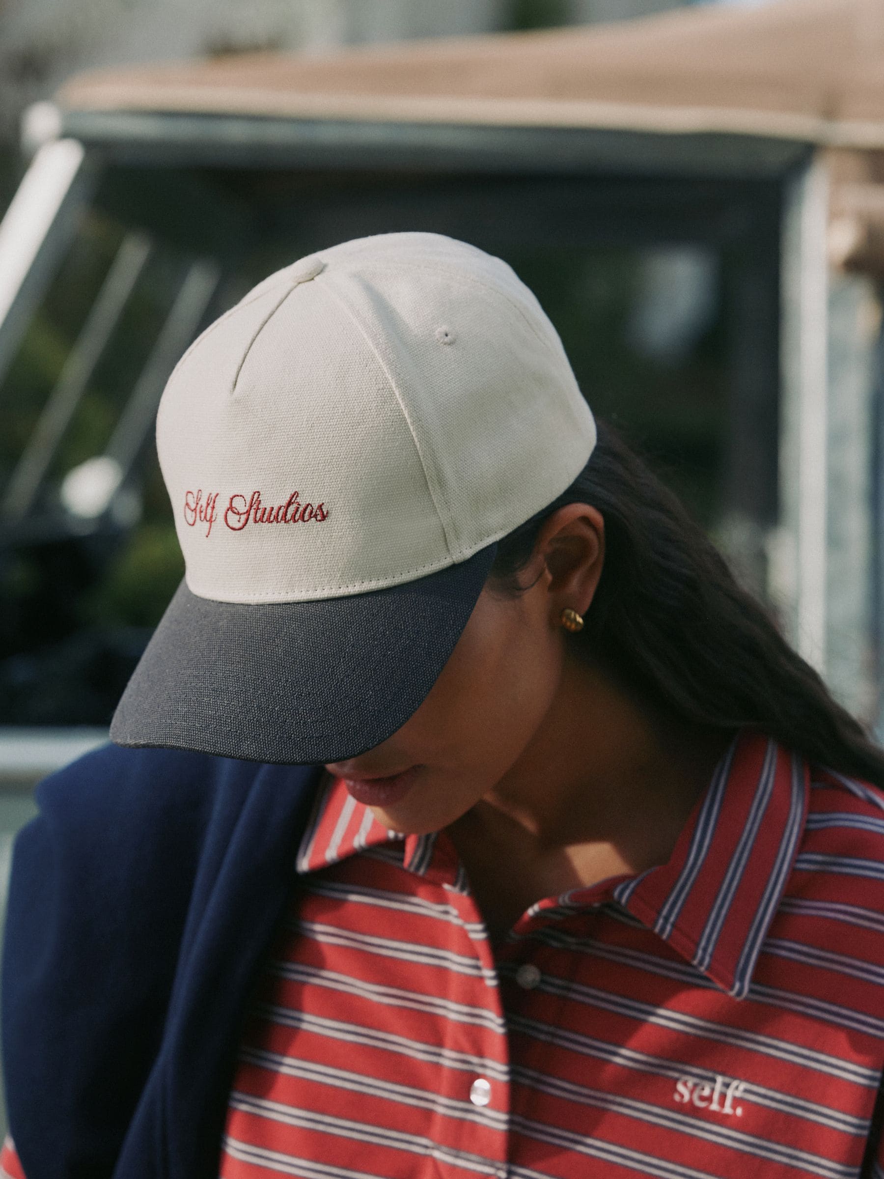 self. cream slogan cap, imported from the UK