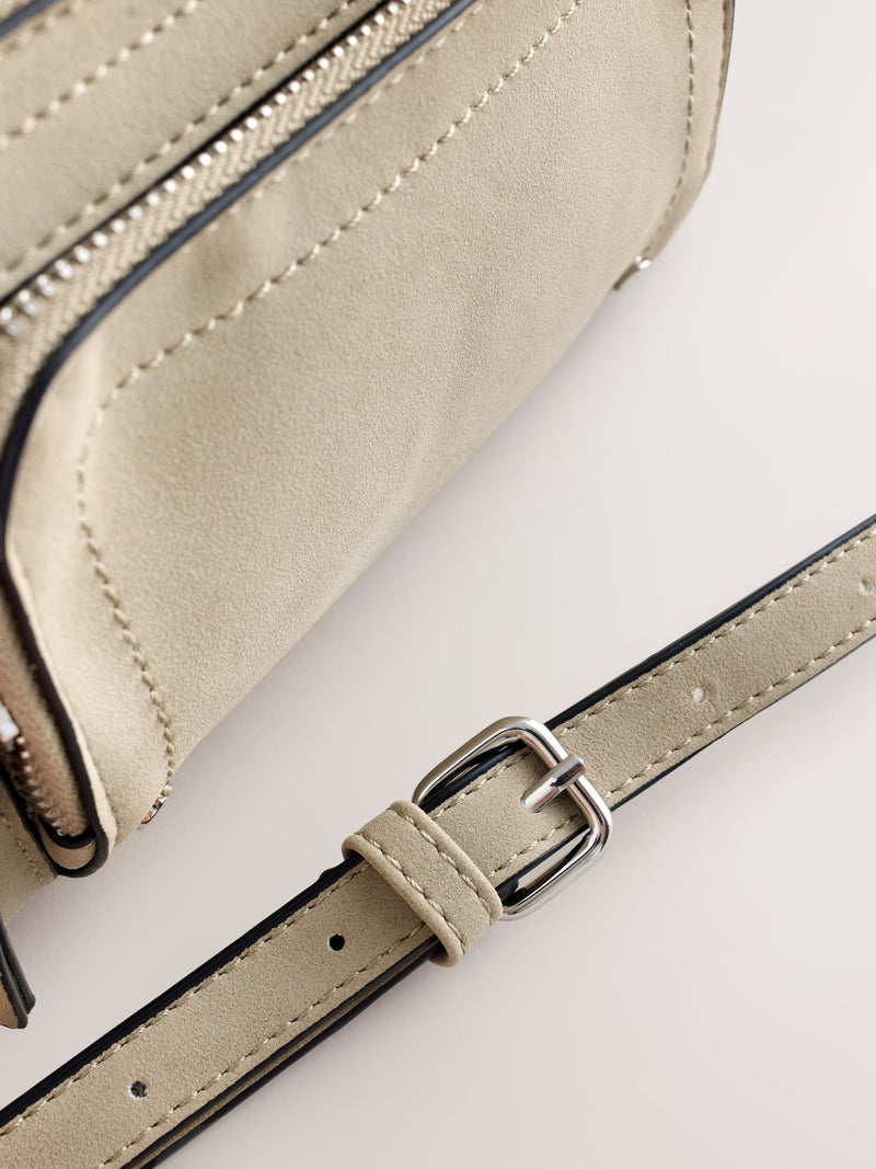 Stone double zip cross-body bag in faux suede, imported from the UK