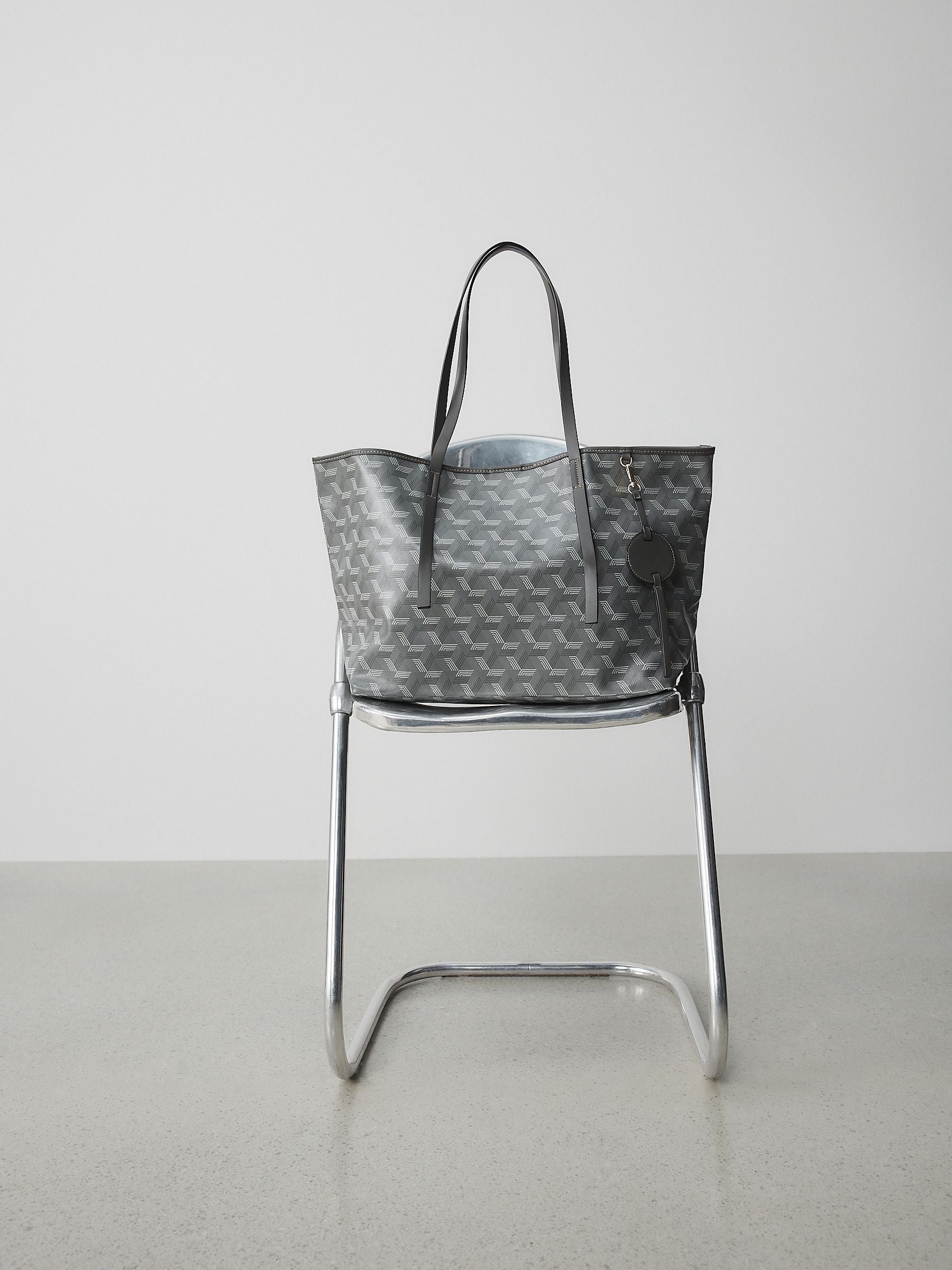 Grey printed shoulder bag, imported from the UK