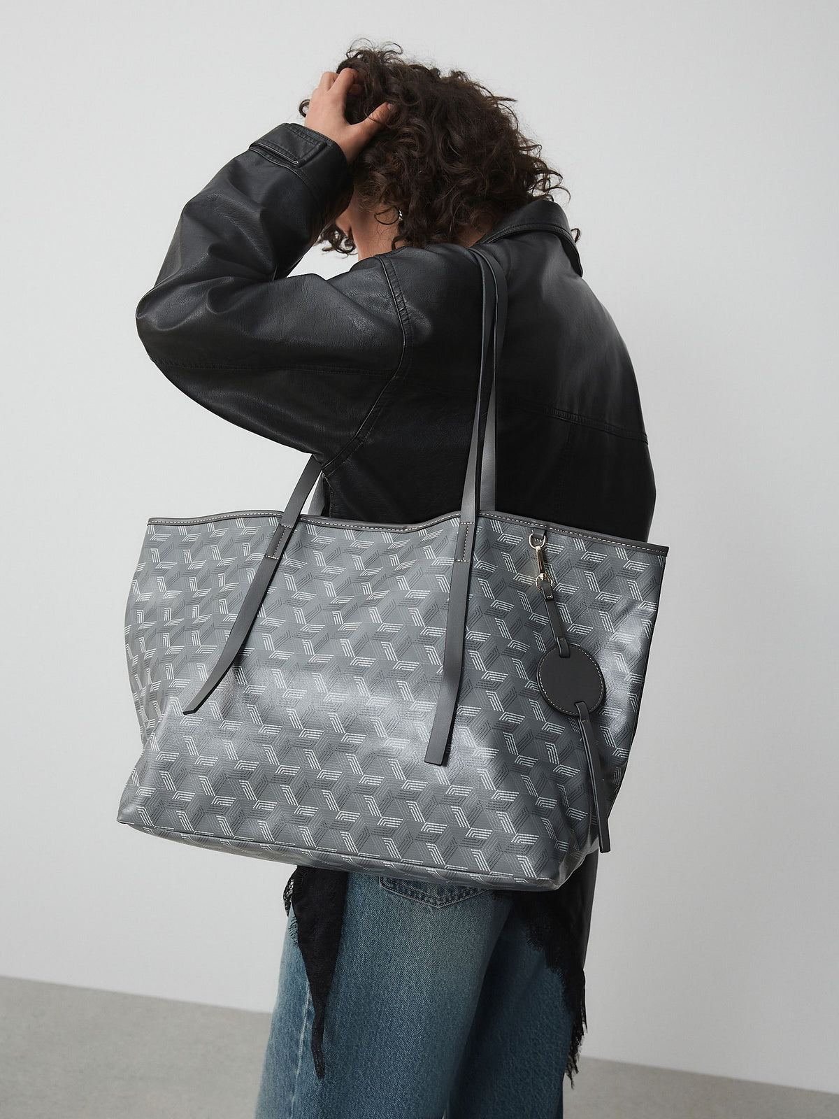 Grey printed shoulder bag, imported from the UK