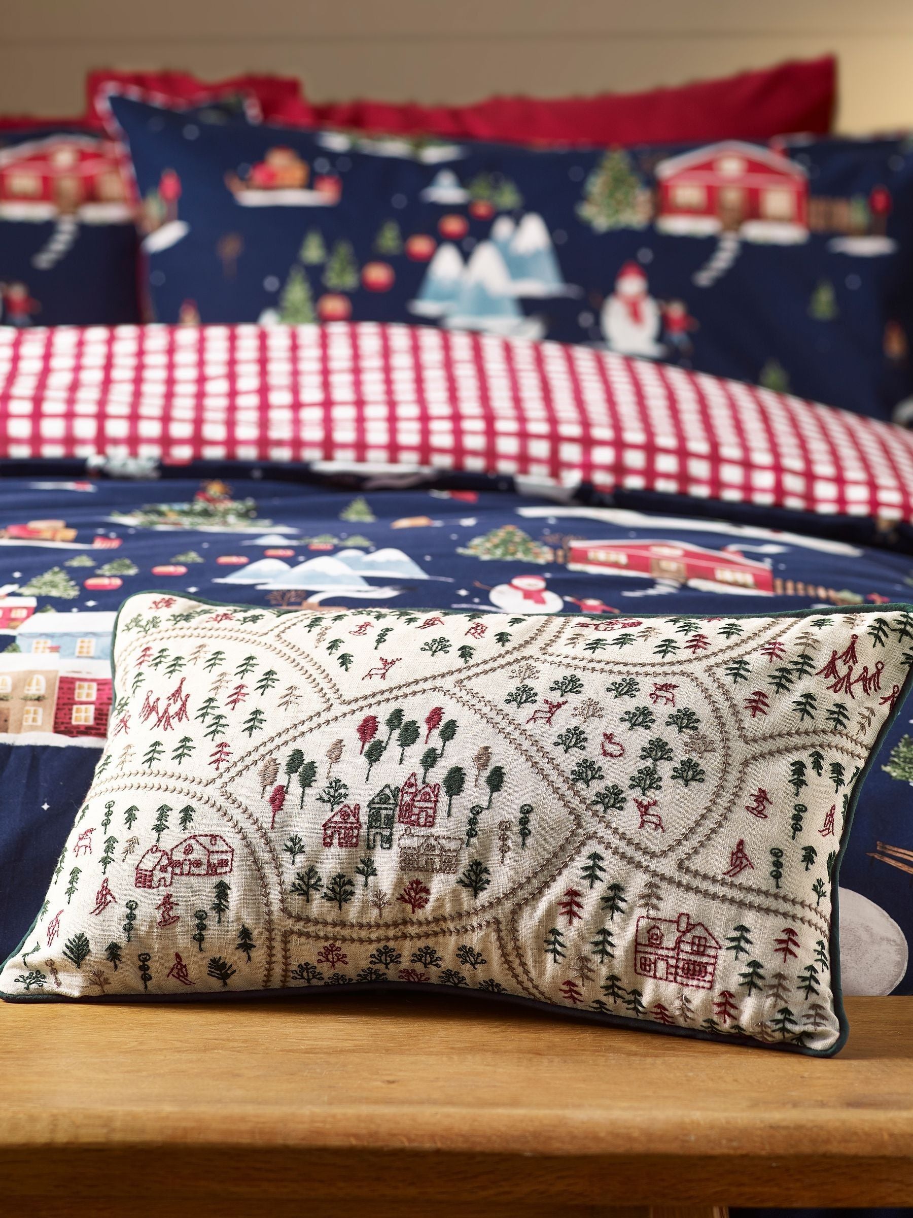 Catherine Lansfield Christmas ski village embroidered cushion 30x50cm - British product