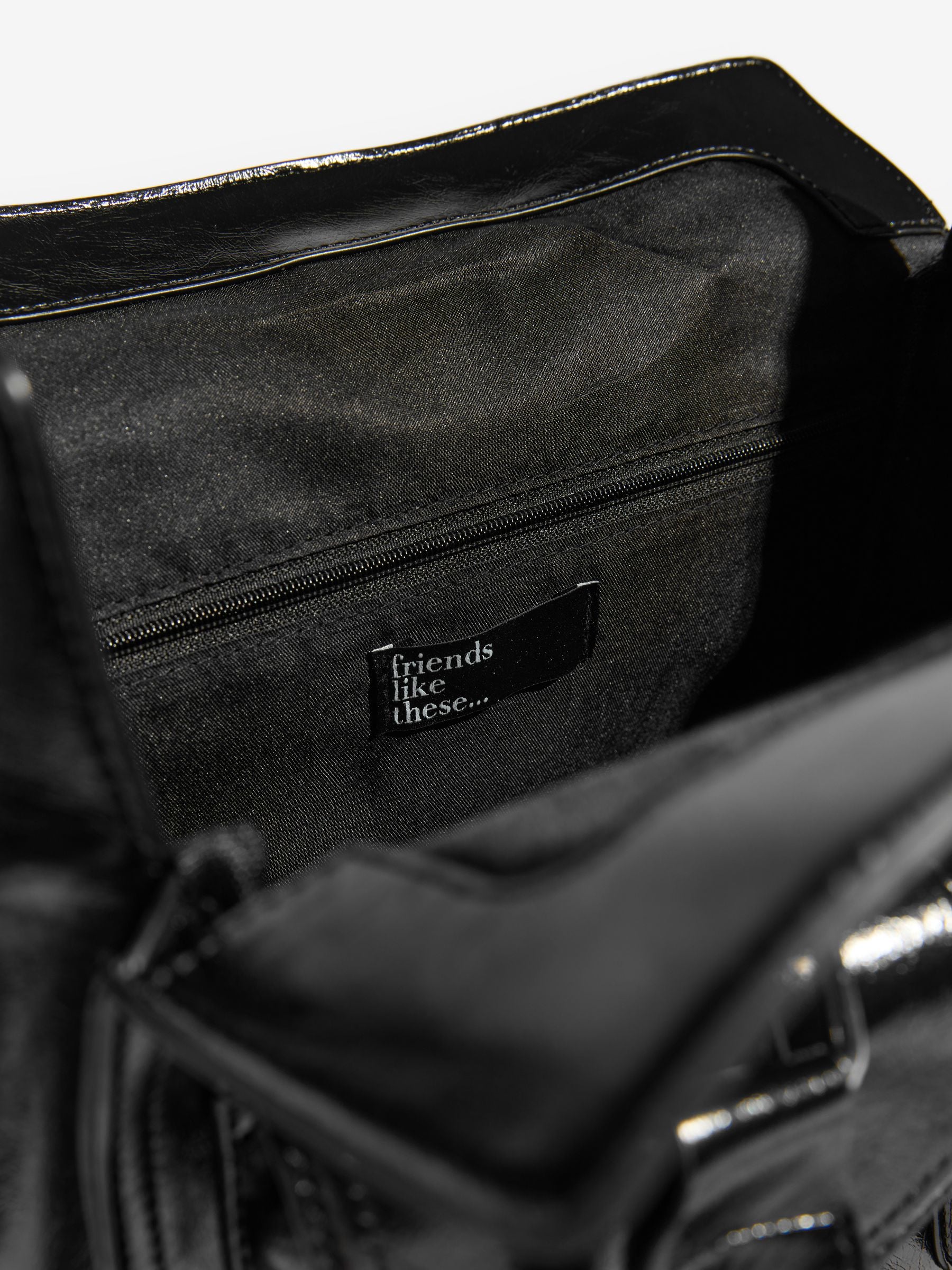 Friends Like These black faux leather padlock pocket bag, UK version