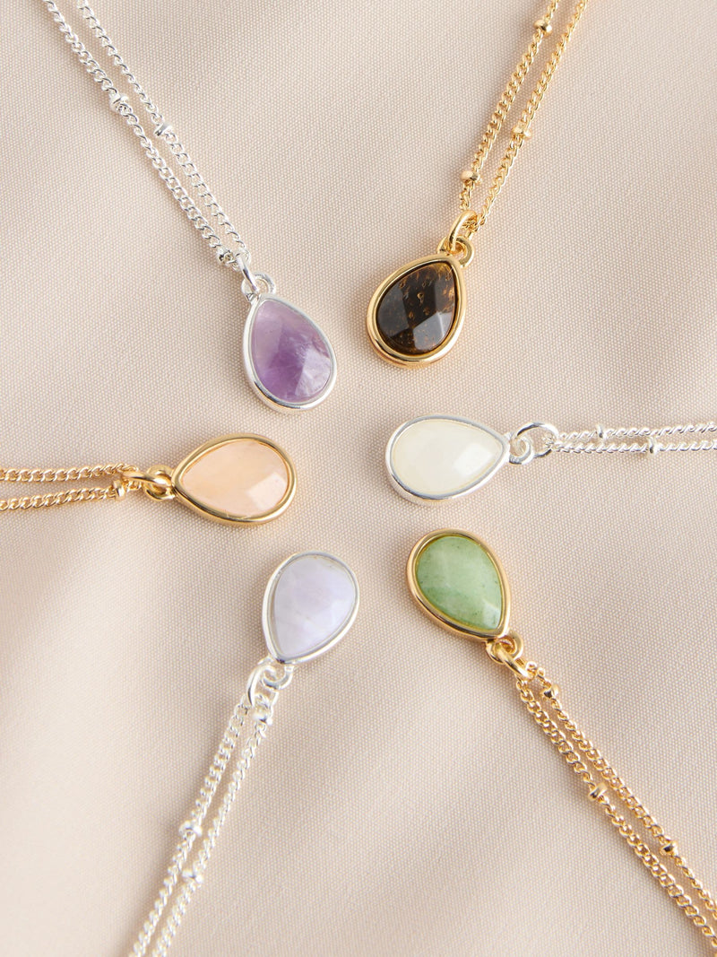 Gold tone semi-precious stone pendant necklace, UK version