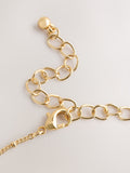 Gold tone semi-precious stone pendant necklace, UK version