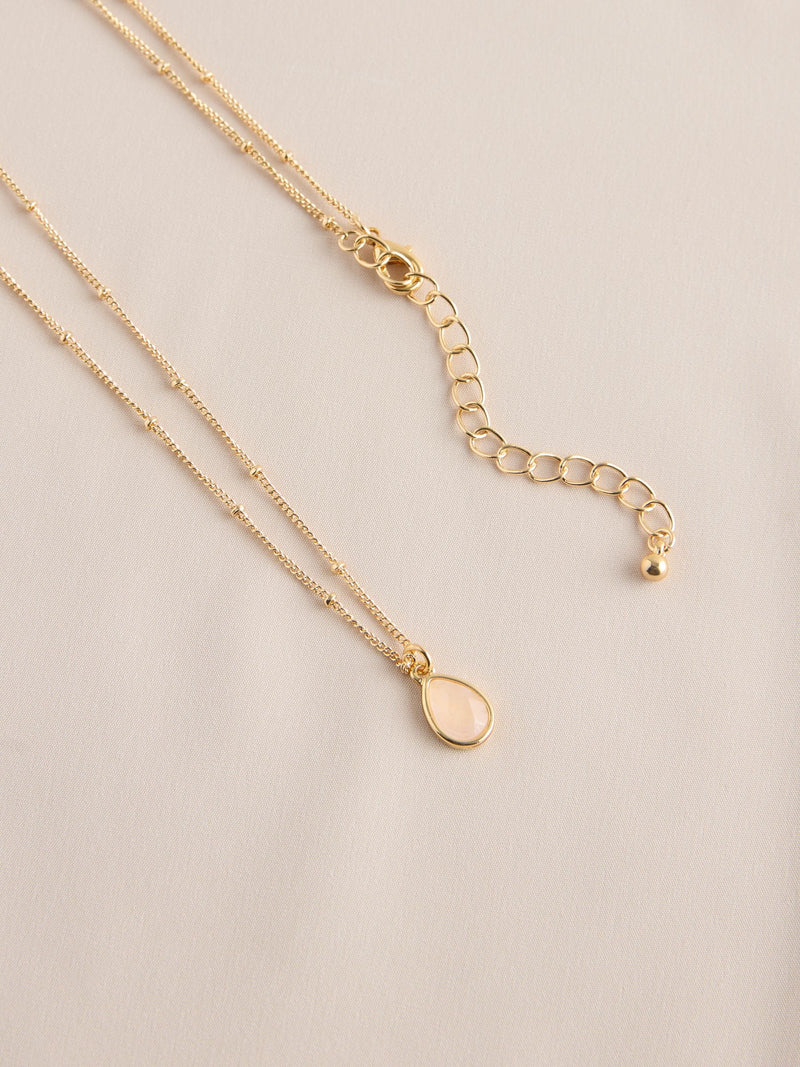 Gold tone semi-precious stone pendant necklace, UK version