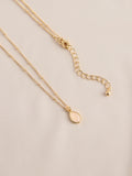 Gold tone semi-precious stone pendant necklace, UK version