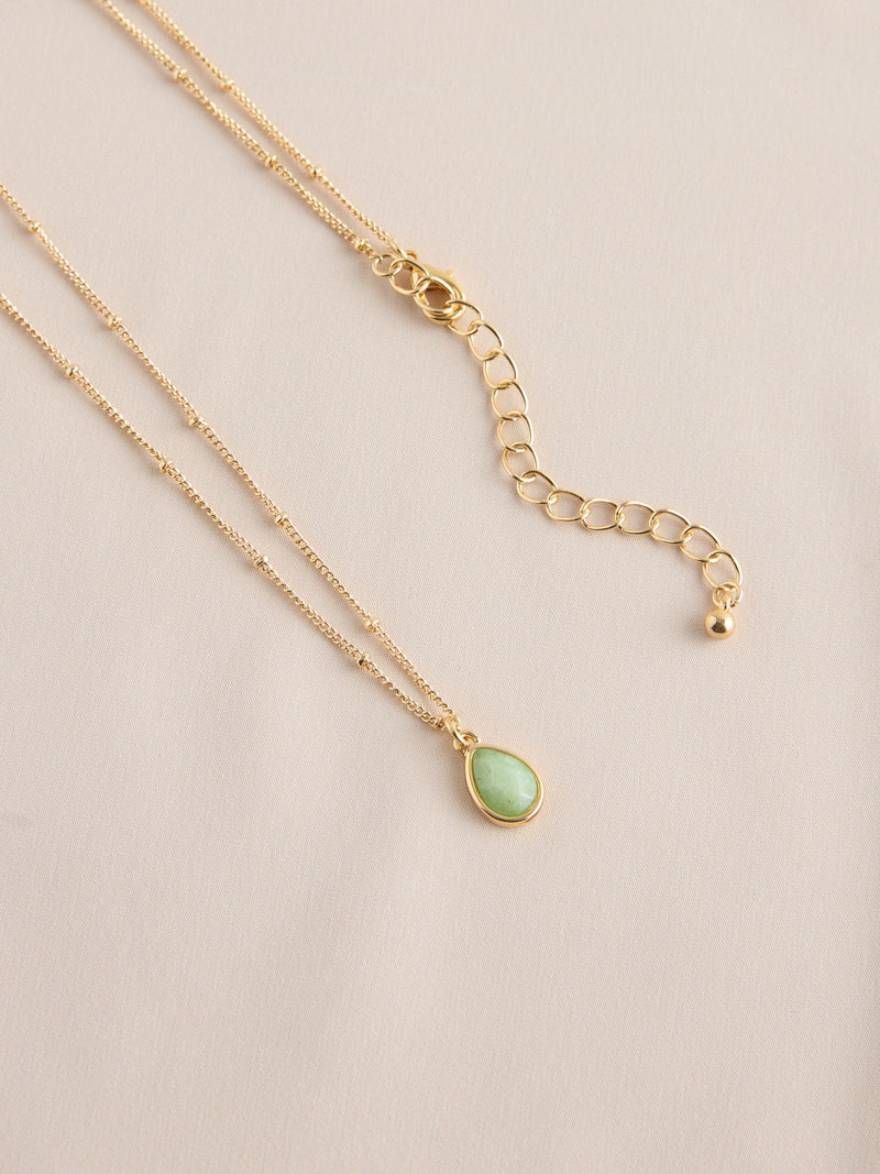 Gold tone semi-precious stone pendant necklace, UK version