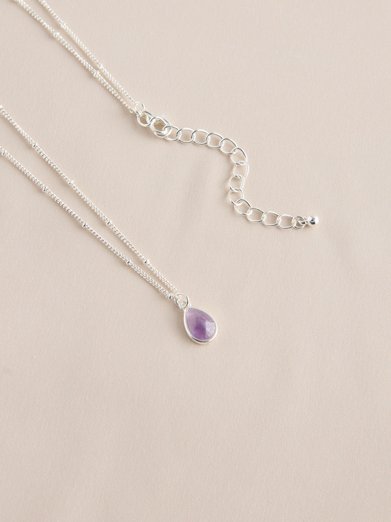Gold tone semi-precious stone pendant necklace, UK version