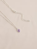 Gold tone semi-precious stone pendant necklace, UK version