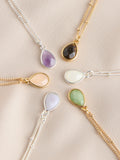 Gold tone semi-precious stone pendant necklace, UK version