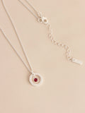 Silver-tone birthstone disc drop necklace (British brand)