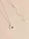 Silver-tone birthstone disc drop necklace (British brand)
