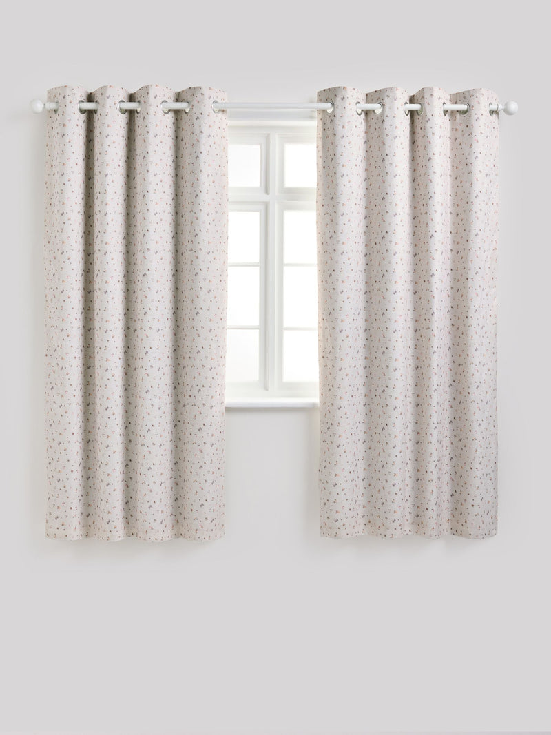 Pink ditsy eyelet blackout curtains, imported from the UK