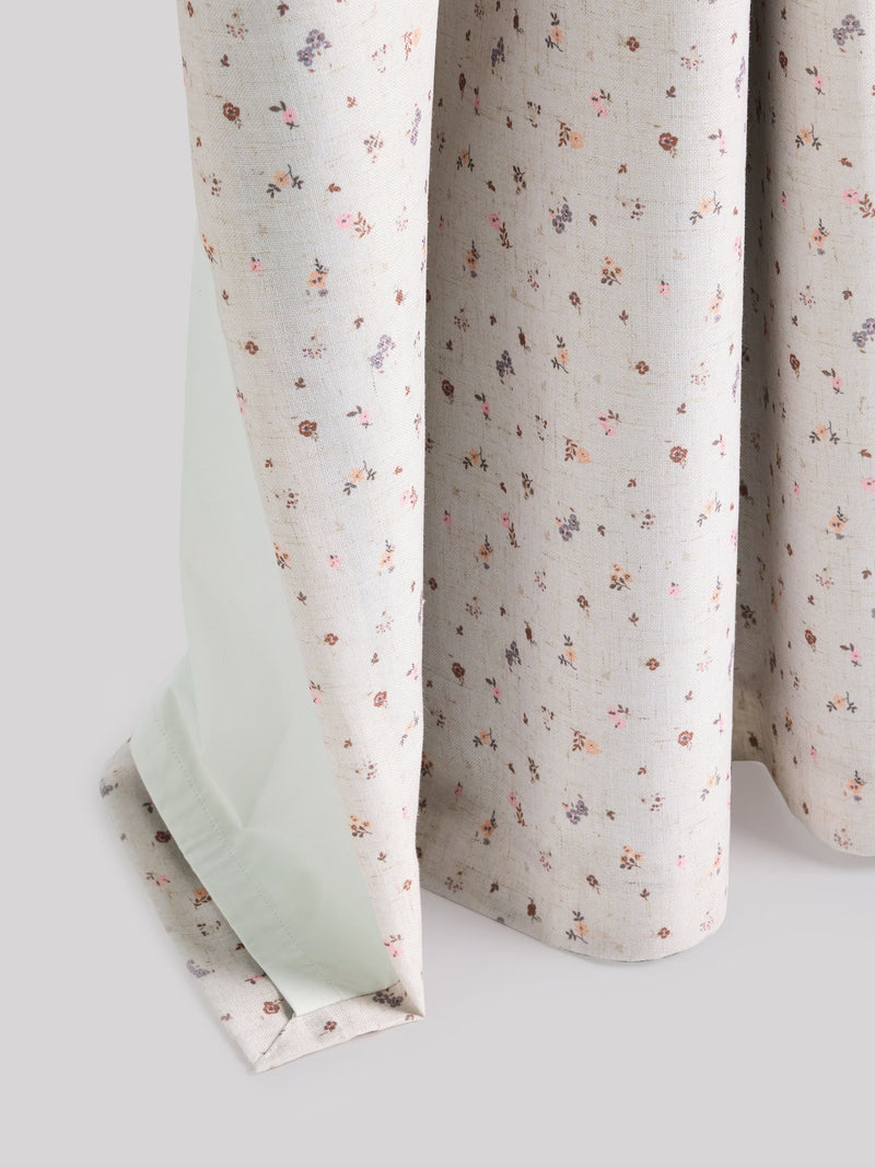 Pink ditsy eyelet blackout curtains, imported from the UK