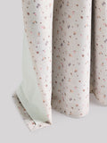 Pink ditsy eyelet blackout curtains, imported from the UK