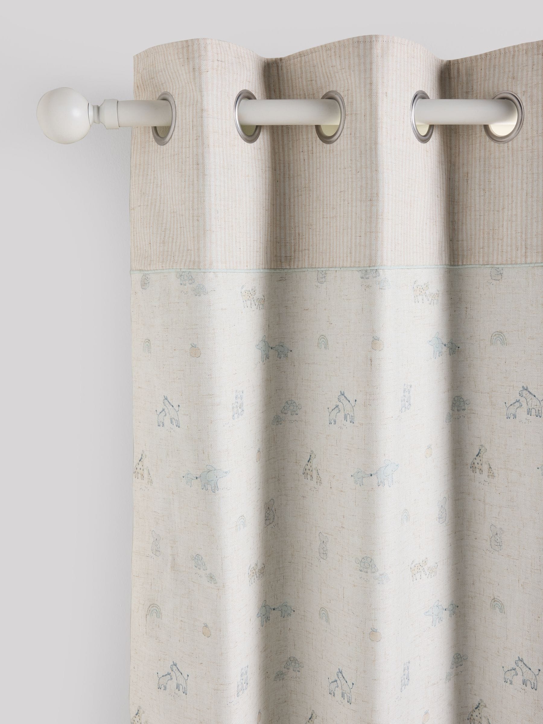Neutral mini jungle eyelet blackout curtains (British brand)